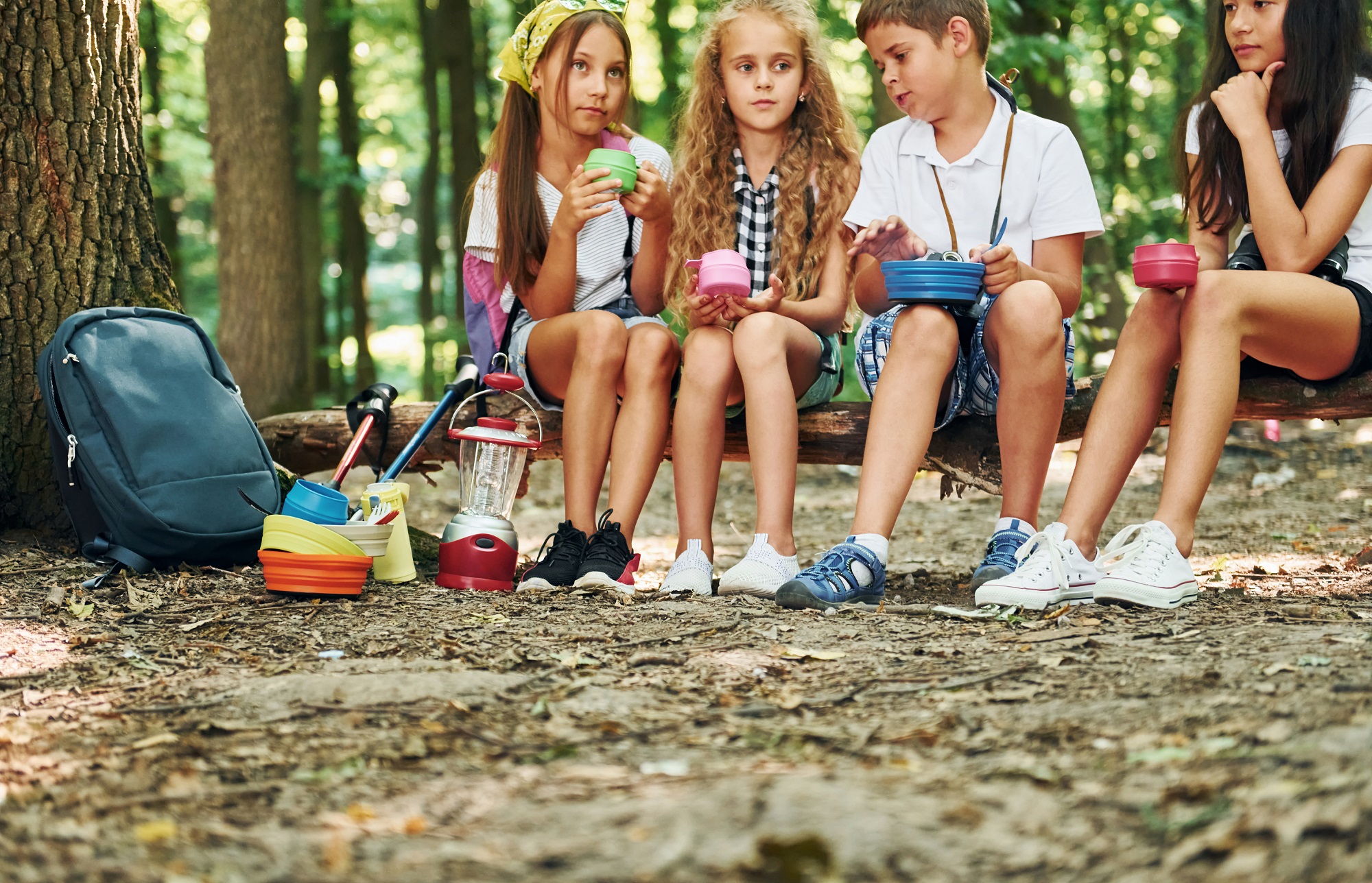 taking-break-kids-strolling-forest-with-travel-equipment